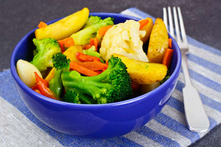 Steamed Vegetables Potatoes, Carrots, Cauliflower, Broccoli Studio Photoの写真素材