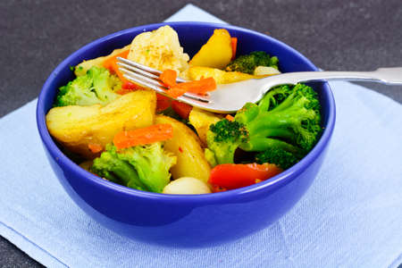 Steamed Vegetables Potatoes, Carrots, Cauliflower, Broccoli Studio Photoの写真素材
