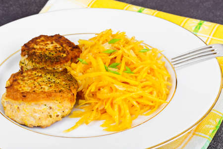 Cutlets from Salmon with Fresh Pumpkin Salad Studio Photoの写真素材