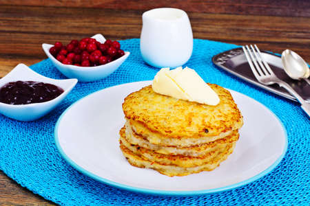 Fried Potato Pancakes with Cranberry Jam. Belarusian and German Cuisine. Studio Photoの写真素材
