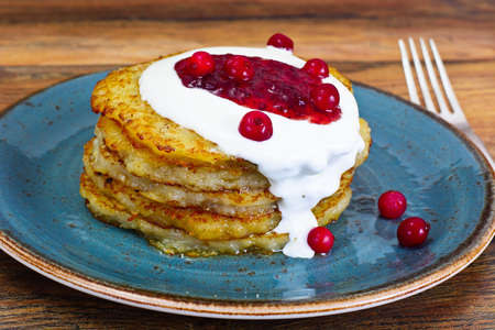 Fried Potato Pancakes with Cranberry Jam. Belarusian and German Cuisine. Studio Photoの写真素材