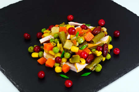 Mexican Mix of Vegetables. Tomatoes, Beans, Celery Root, Green Beans, Peas, Corn. Dietary Foodの写真素材