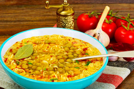 Healthy and diet food: White beans, canned peas, noodles, saffron. Studio Photo