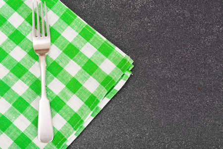 Kitchen Napkins Serving on Dark background. Studio Photo