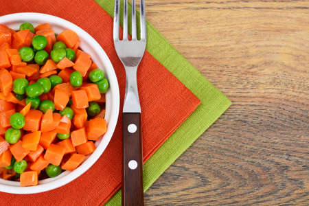 Juicy Vegetable Stew. Paprika, Peas and Carrots. Diet Food. Studio Photoの写真素材
