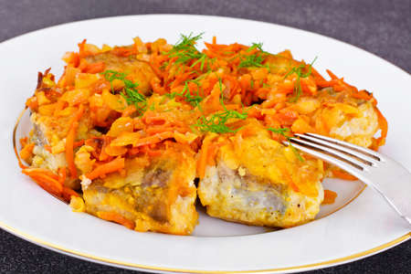 Fish in Greek with Onion and Carrot Studio Photoの写真素材