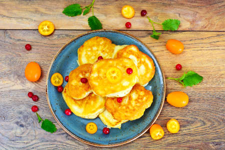 Pancakes with Kumquats and Cranberries Studio Photo