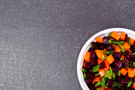 Salad of Cooked Beets and Carrots with Green Leek Studio Photoの写真素材