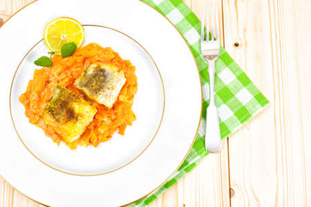 Fish in Greek with Onion and Carrot Studio Photoの写真素材