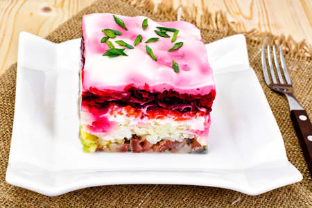 Russian Shuba Salad with Beetroot, Potatoes, Carrots and Herring Studio Photo