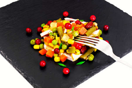 Mexican Mix of Vegetables. Tomatoes, Beans, Celery Root, Green Beans, Peas, Corn. Dietary Foodの写真素材