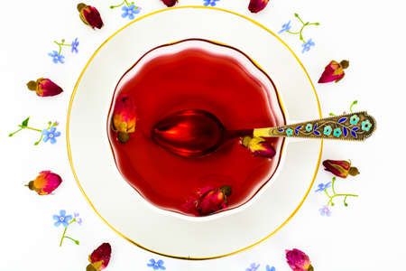 Red Rose Hibiscus Tea with Flowers Studio Photoの写真素材