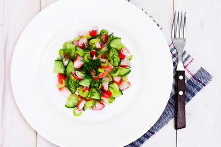 Salad of Celery, Crab Stick, Cucumber, Green Olives and Dill Studio Photoの写真素材