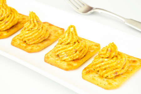 Forshmak: Herring with Butter, Carrots and Crackers. Studio Photo