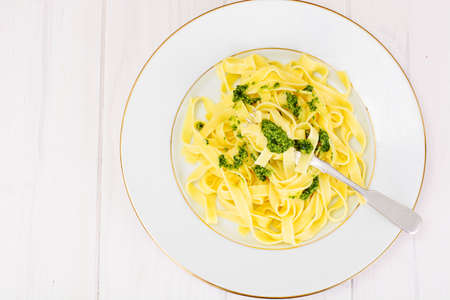 Fettuccine and Tagliatelle with Basil Pesto Studio Photoの写真素材
