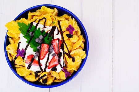 Cornflakes with Strawberry and Chocolate. Healthy Breakfast Studio Photoの写真素材