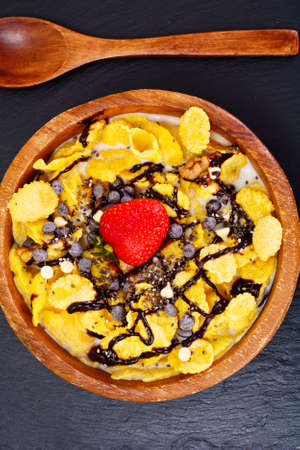 Cornflakes with Strawberry and Chocolate. Healthy Breakfast Studio Photoの写真素材