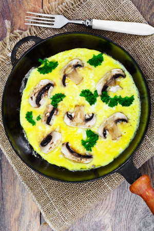 Healthy and Diet Food: Scrambled Eggs with Mushrooms and Vegetables. Studio Photoの写真素材