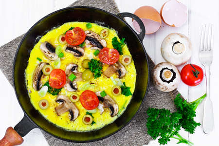 Healthy and Diet Food: Scrambled Eggs with Mushrooms and Vegetables. Studio Photoの写真素材