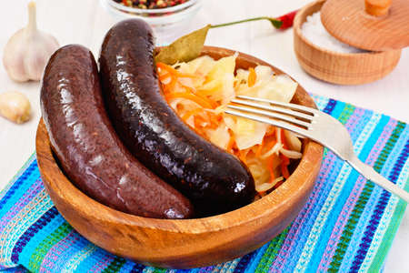 Black Pudding Kaszanka with Sauerkraut Studio Photoの写真素材