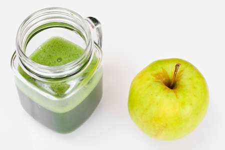 Juice from Apple, Cucumber and Parsley Studio Photoの写真素材
