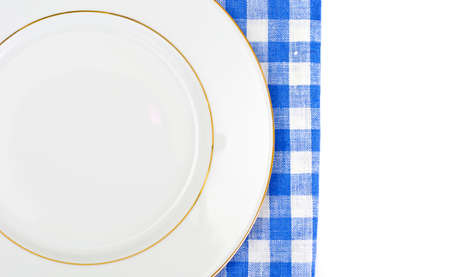 White Empry Plate on a Tablecloth with Place for Your Text Studio Photo