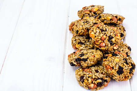 Cookies with Raisins, Peanuts, Sunflower Seeds, Oat Flakes and Honey Studio Photoの写真素材