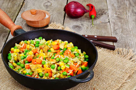 Risotto with Vegetables, Carrots, Peas and Chicken. Studio Photoの写真素材
