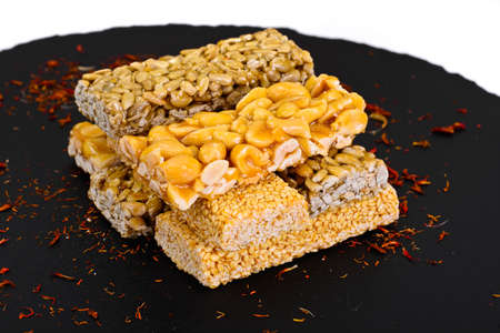 Kozinaki with Nuts, Sesame on Dark Background Studio Photoの写真素材