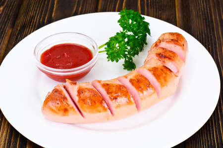 Sausage on the Grill on Plate Studio Photoの写真素材