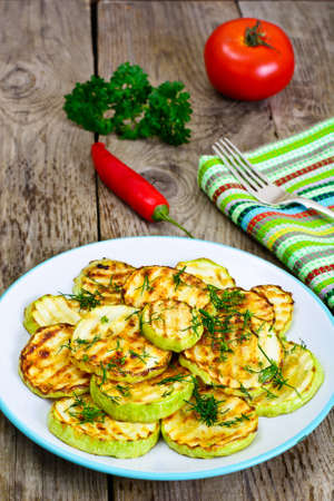 Zucchini Grilled with Fennel on Wooden Background Studio Photoの写真素材