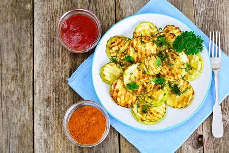 Zucchini Grilled with Fennel on Wooden Background Studio Photoの写真素材