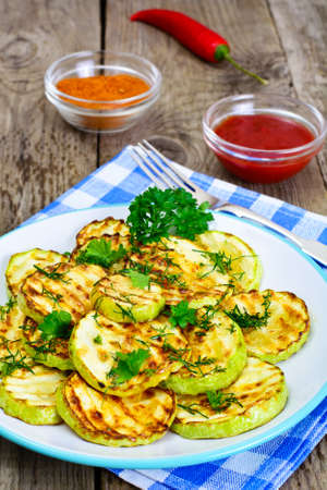 Zucchini Grilled with Fennel on Wooden Background Studio Photoの写真素材