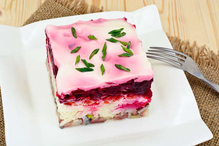 Russian Shuba Salad with Beetroot, Potatoes, Carrots and Herring Studio Photoの写真素材