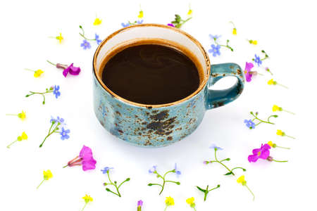 Coffee in a Blue Retro Cup with Flowers. Studio Photoの写真素材