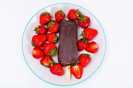 Ice Cream with Strawberries on Plate Studio Photoの写真素材