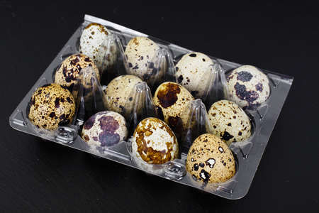 Quail Eggs on Black Background Studio Photoの写真素材