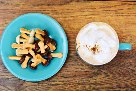 Mushrooms Biscuits with Cappuccino Coffee Studio Photoの写真素材