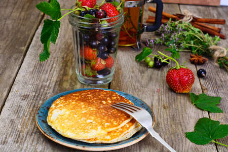 Tasty Pancakes Stack with Strawberry and Currant Studio Photoの写真素材