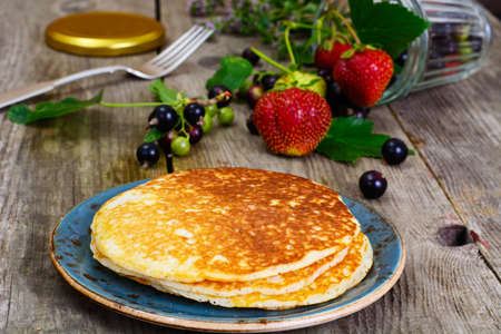 Tasty Pancakes Stack with Strawberry and Currant Studio Photoの写真素材