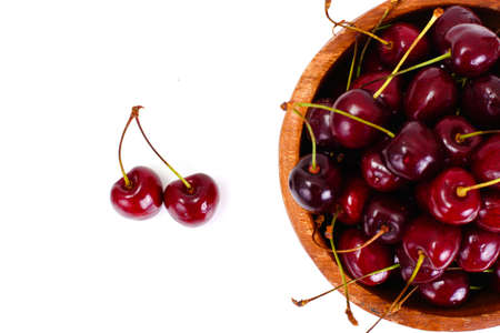 Fresh Cherry in Wooden Bowl Studio Photoの写真素材