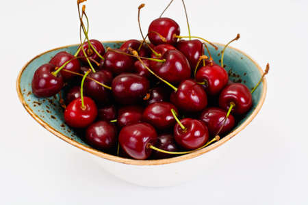 Fresh Cherry in Wooden Bowl Studio Photoの写真素材