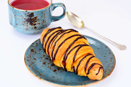 Tea and Croissant. French Breakfast Studio Photoの写真素材