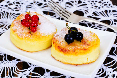 Cheesecakes with Chocolate and Red Currant Studio Photoの写真素材