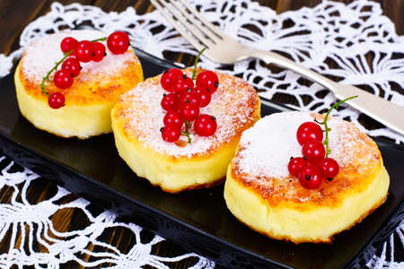 Cheesecakes with Chocolate and Red Currant Studio Photoの写真素材