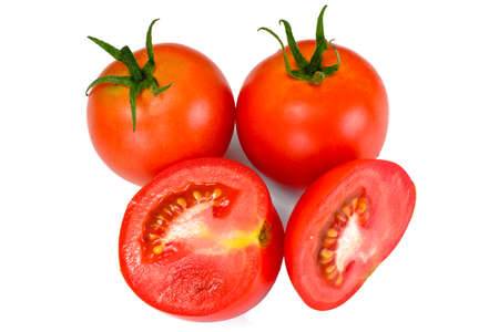 Red Tomatoes Isolated on a White Background Studio Photoの写真素材