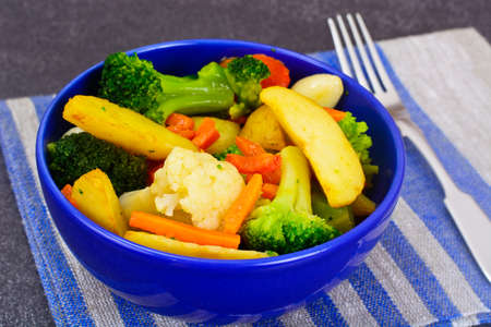 Steamed Vegetables Potatoes, Carrots, Cauliflower, Broccoli Studio Photoの写真素材