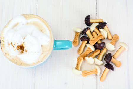 Mushrooms Biscuits with Cappuccino Coffee Studio Photoの写真素材