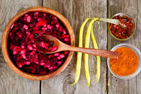 Vinaigrette with Beans on Raw Boards Studio Photoの写真素材