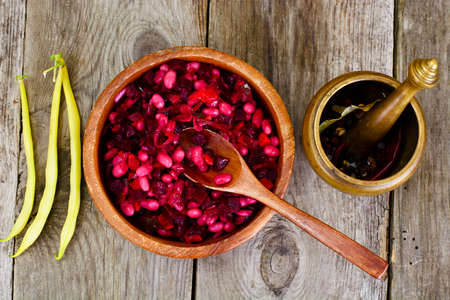 Vinaigrette with Beans on Raw Boards Studio Photoの写真素材